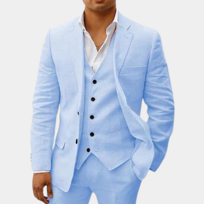 Model wearing the suit in pale sky blue, with black buttons on the vest and jacket. 4