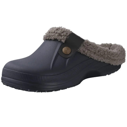 Dark navy clog with grey fleece collar, button strap and ridged sole, angled front view 2