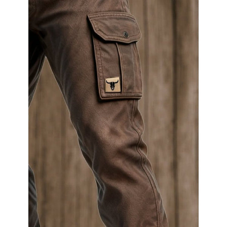 Close-up of the buttoned cargo pocket on the thigh, with a small patch and visible seams 6