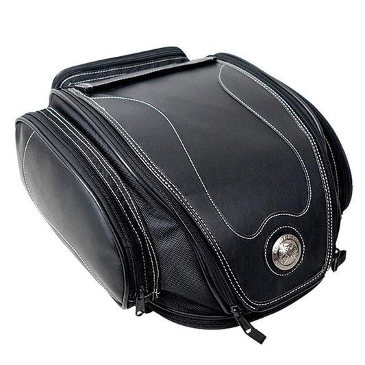 Waterproof motorbike tail bag with a fold-out storage compartment.