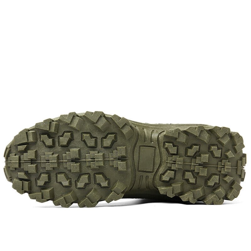 Close view of the olive green boot's deep, chunky lugged rubber outsole from underneath 22