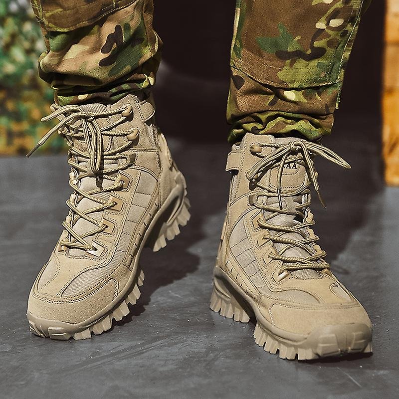 Front view of both sand-coloured boots on a model in camouflage trousers, showing the laces 3