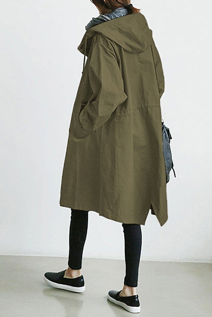 Back view of an olive-green hooded coat with drawstring waist and side slit, worn with black leggings 3