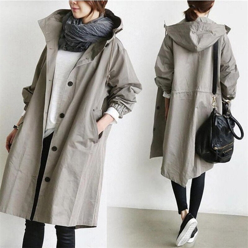 Front and back views of a light grey-beige hooded coat, with a black handbag on the shoulder 9