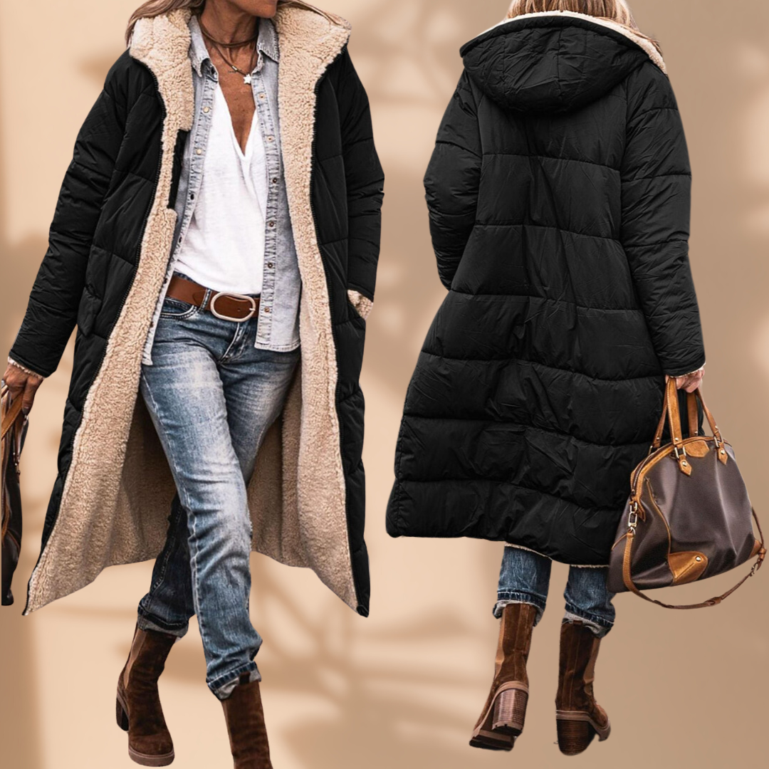 Front and back views of the long black quilted coat with cream fleece lining, worn with jeans, boots and a handbag. 2