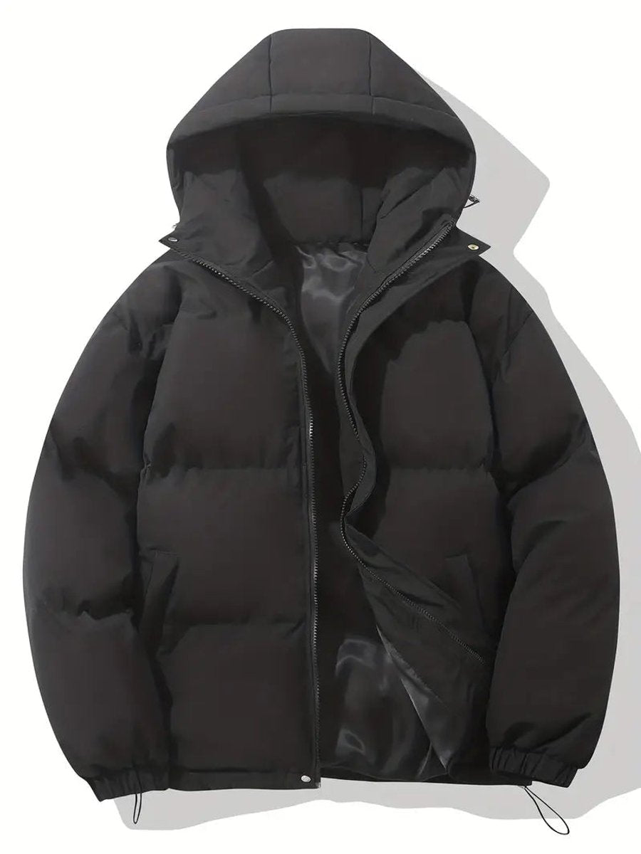 Black hooded puffer jacket laid flat, zip partly open to show the shiny grey lining 2