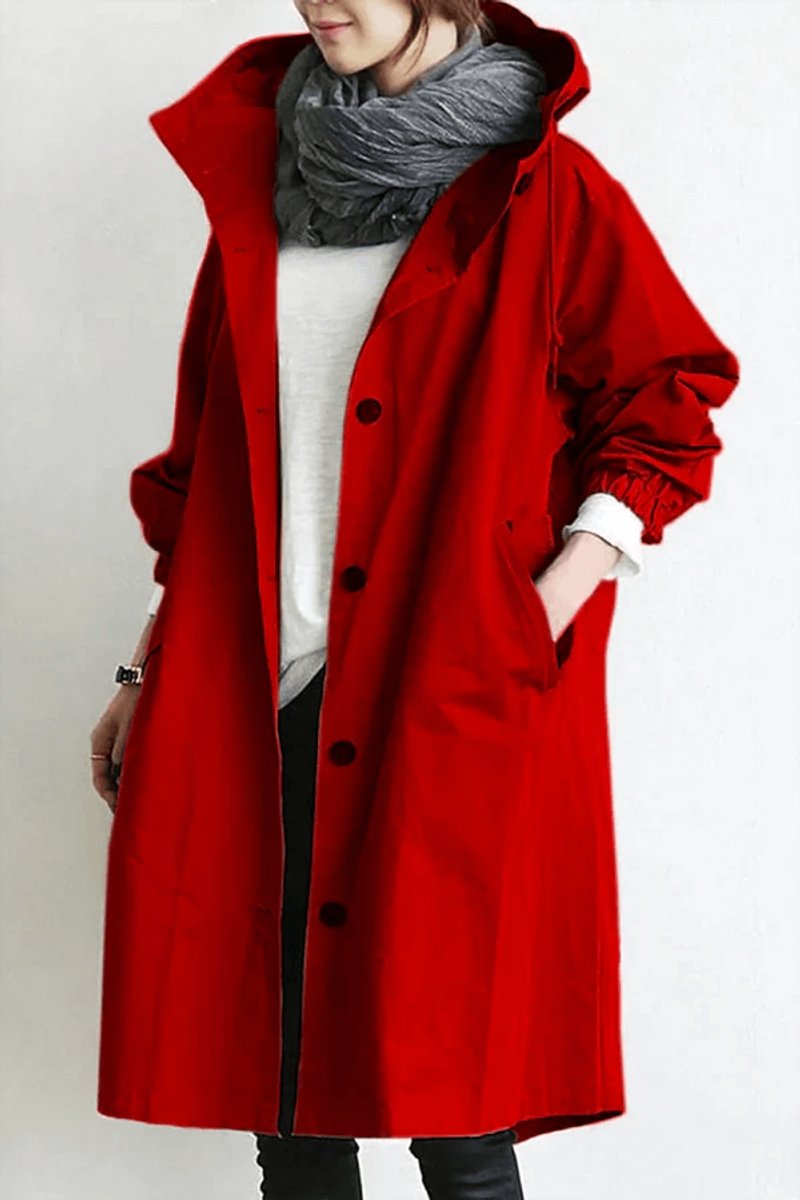Front view of the long hooded coat in red, with grey scarf and elasticated cuffs 4