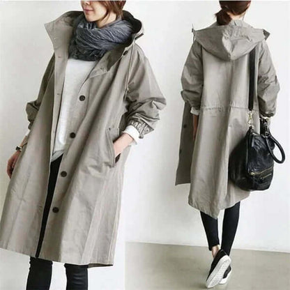 Two views of the light grey coat: buttoned front on the left, back with hood and drawstring waist on the right 6
