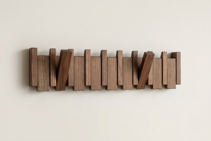 Dark walnut rack with uneven slat heights and two hooks swung out at an angle 12