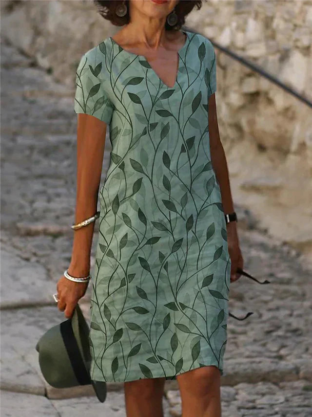Enchanting Dress with Magical Design in Emerald Green - GreenAura