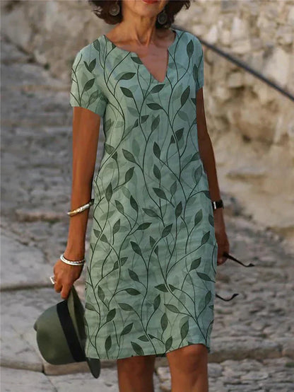 Enchanting Dress with Magical Design in Emerald Green - GreenAura